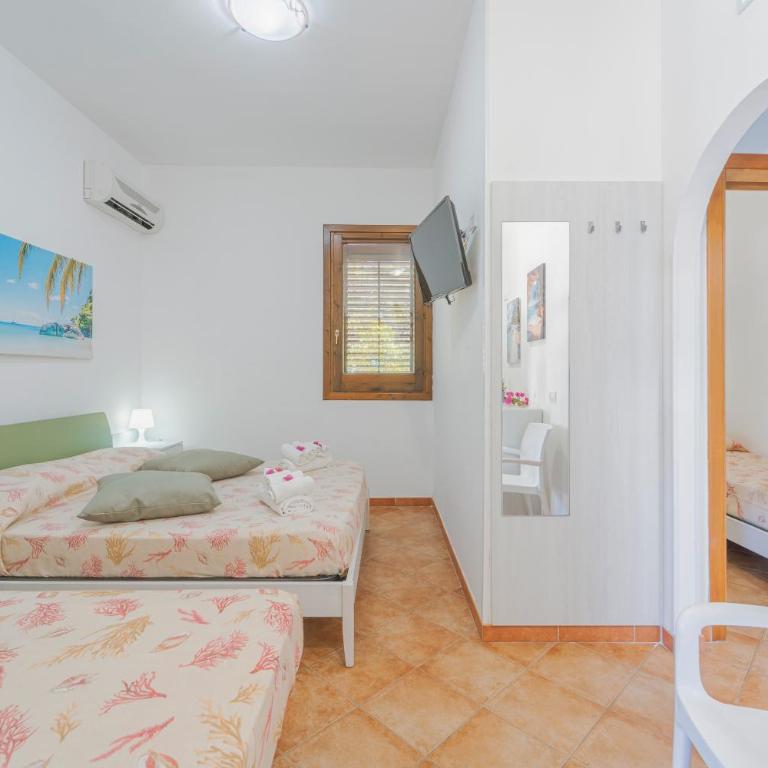 Camping Villaggio Egad - Standard Quadruple Room - 8