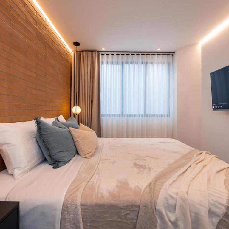 Apartamento 401, cerca al estadio, AC - Three-Bedroom Apartment - 64