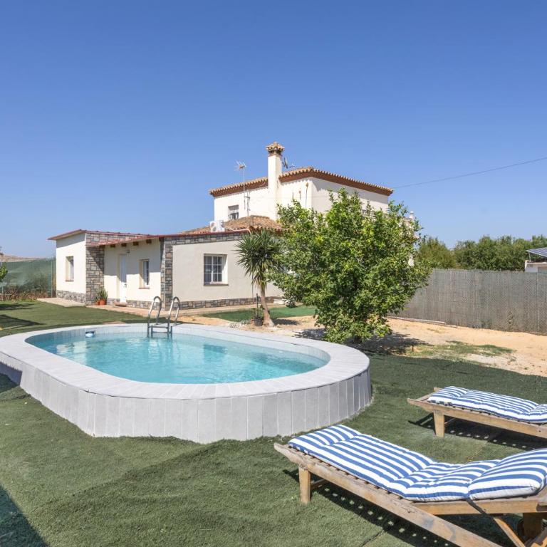 Villa Manoli - Appartamento Deluxe con 2 Camere da Letto e Vista Giardino - 1