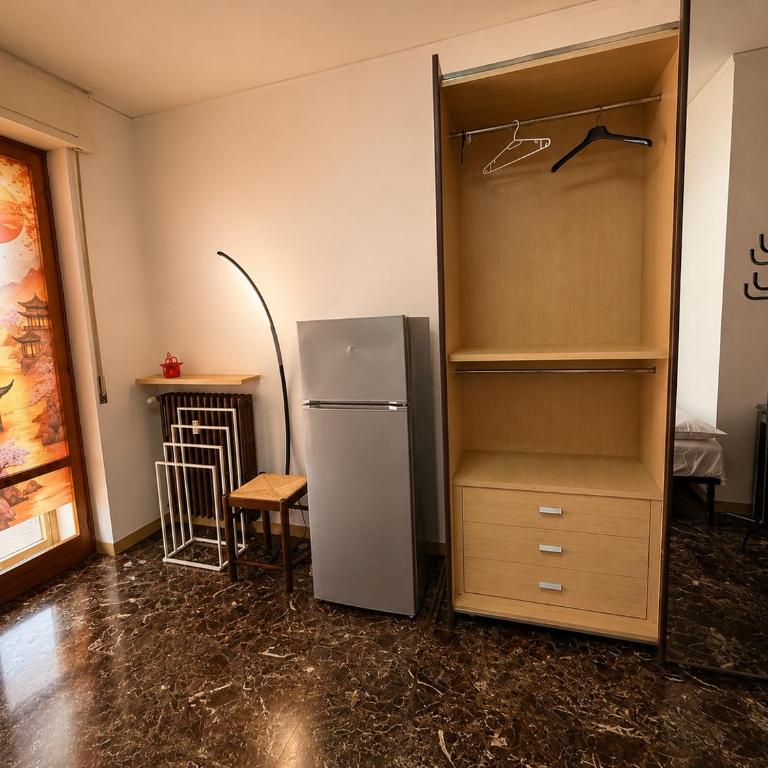 INDULGEO Home Barana - Camera Tripla con Bagno in Comune - 5