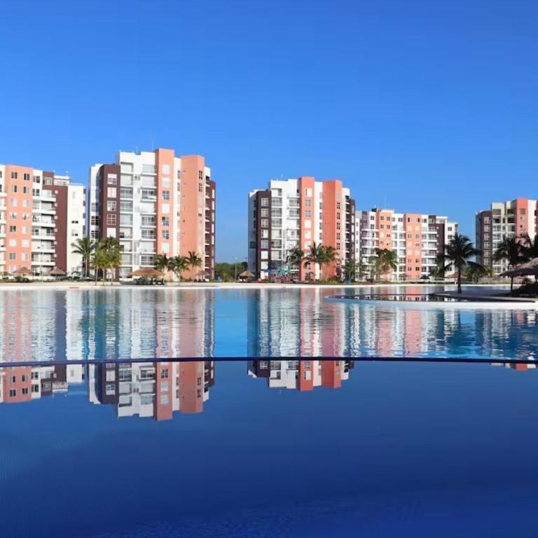 Oasis de lujo en Canún - Apartamento de 2 dormitorios con vistas a la piscina - 7