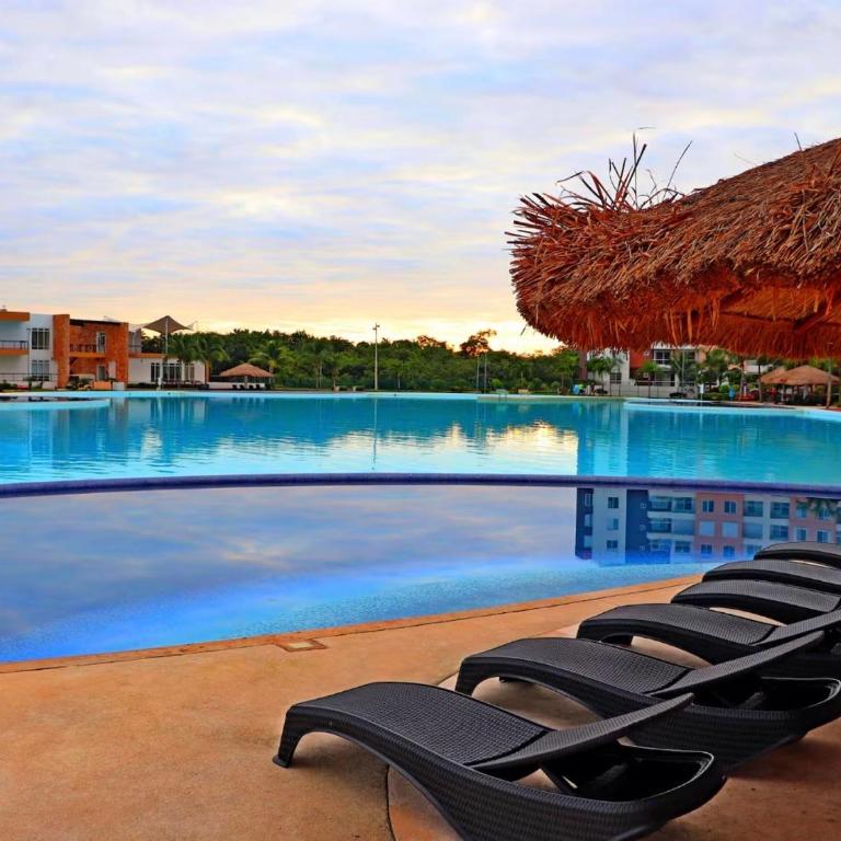 Oasis de lujo en Canún - Apartamento de 2 dormitorios con vistas a la piscina - 28