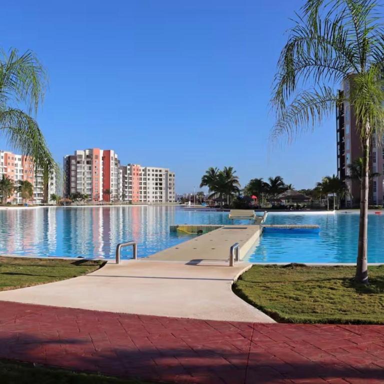 Oasis de lujo en Canún - Apartamento de 2 dormitorios con vistas a la piscina - 27