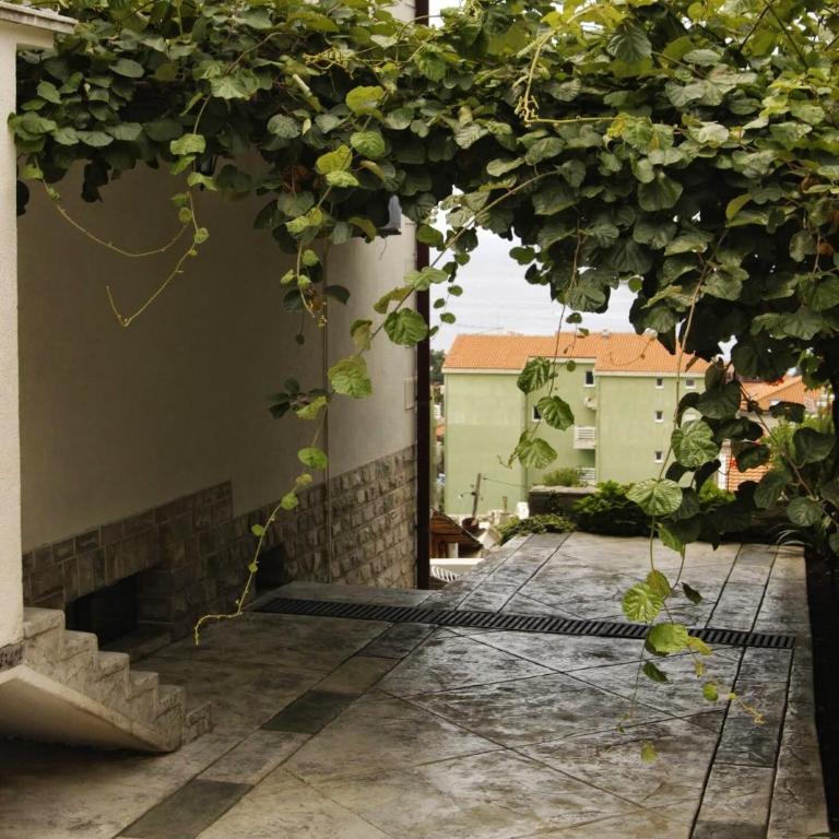 Villa Petrovac Guesthouse Rooms - Deluks Trokrevetna Soba sa Pogledom na More - 19