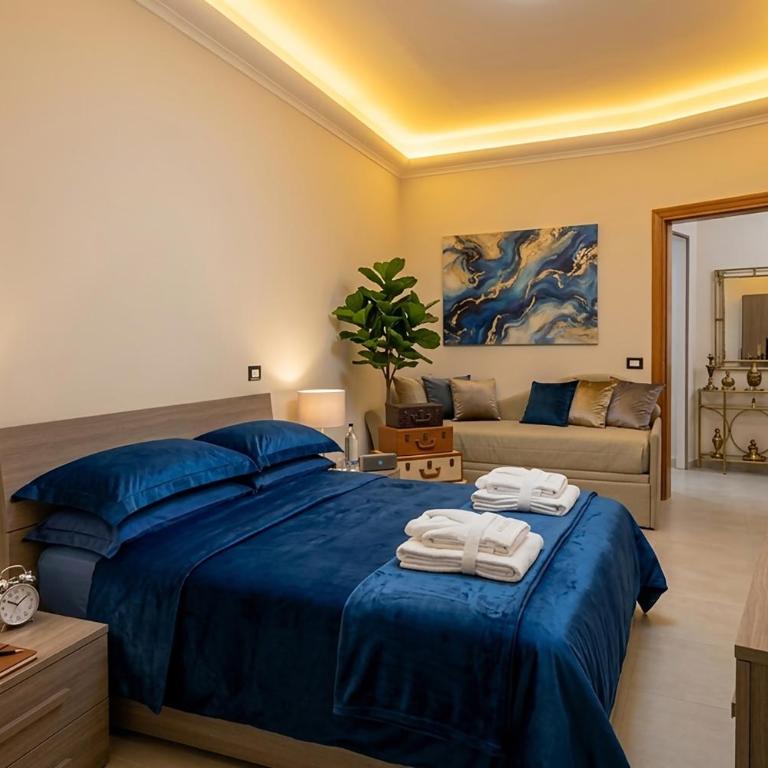 MaX RelaX Suite - Bed & Breakfast - Vicino Stazione Napoli Centro Storico - Camera Quadrupla Superior - 1