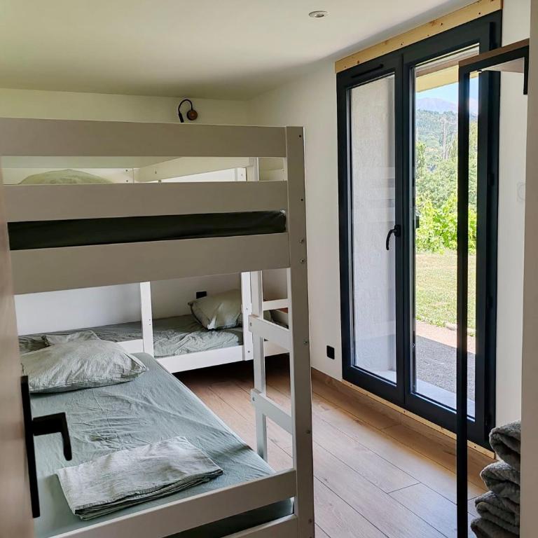 Havre de paix face au lac - Jardin, bain nordique & BBQ - Maison 2 Chambres - 24