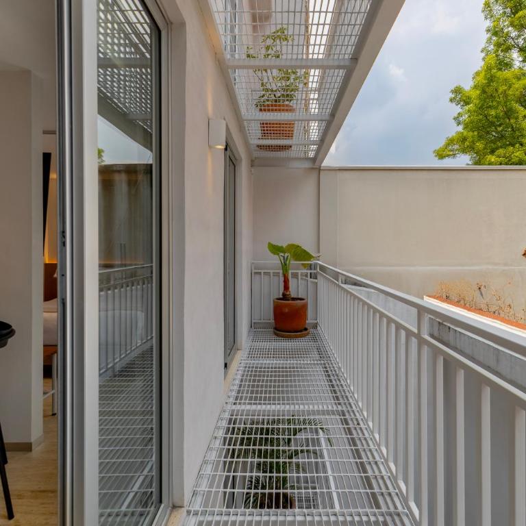 Casa Hugo by Capitalia - Estudio Superior - 12