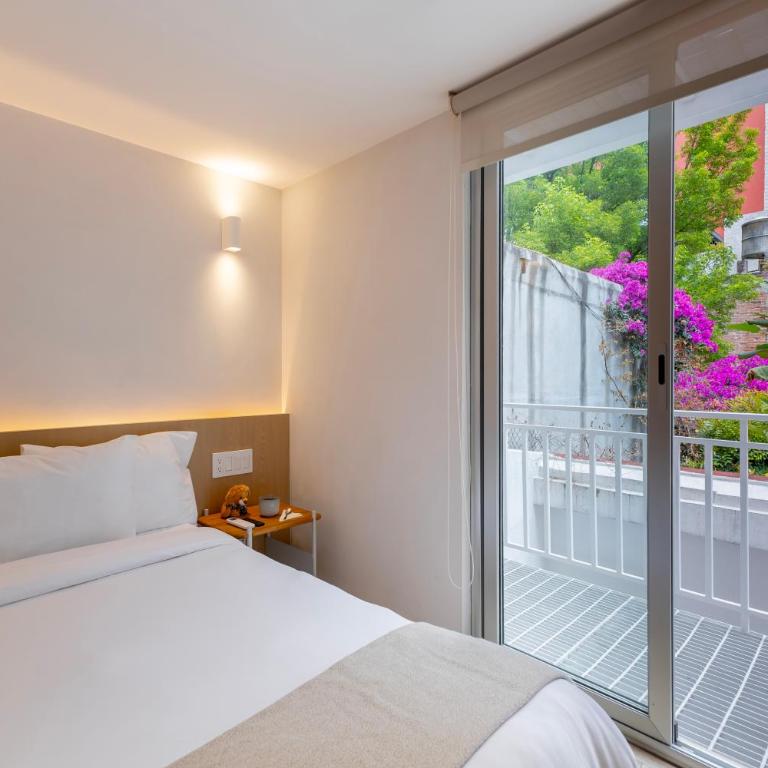 Casa Hugo by Capitalia - Estudio Superior - 9