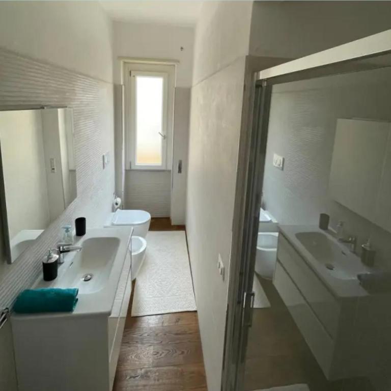 T-Rooms - Camera Matrimoniale/Doppia con Letti Singoli con Bagno in Comune - 14