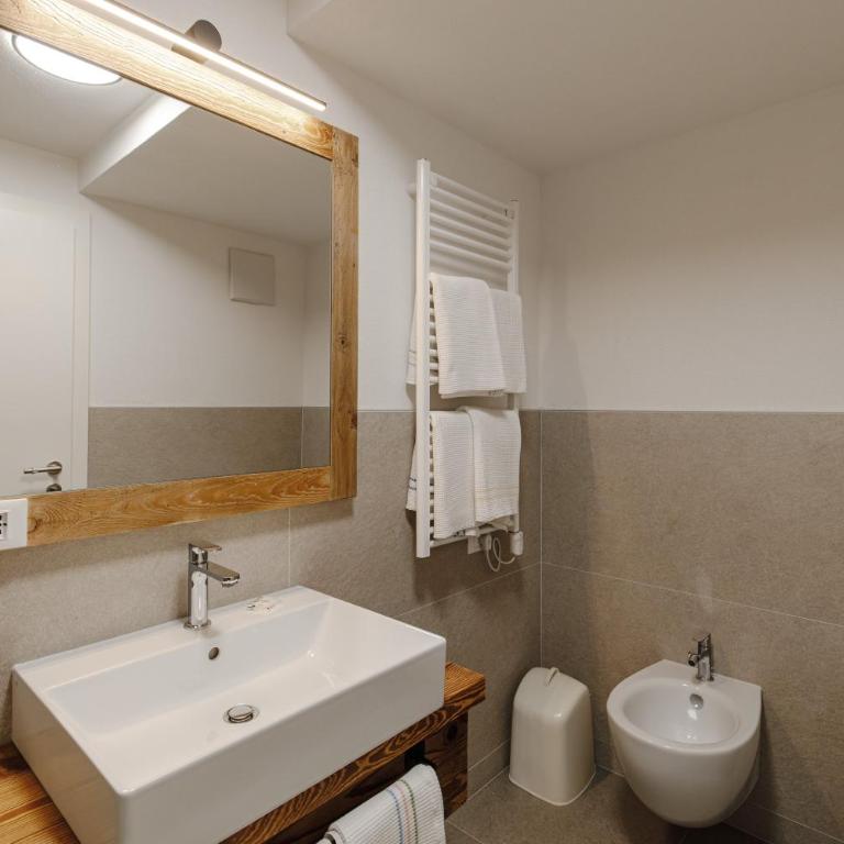 Appartamento Aurone - con Biosauna - Appartamento Deluxe con 2 Camere da Letto e Vista Giardino - 4