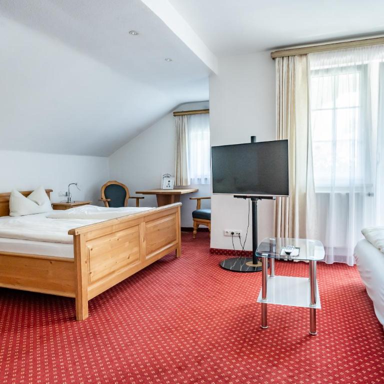 Gästehaus Alpenkranz - Familienzimmer mit Balkon - 11