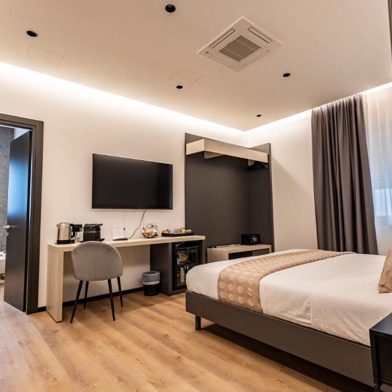Corso 84 Luxury Suites - Zimmer mit Kingsize-Bett - 12