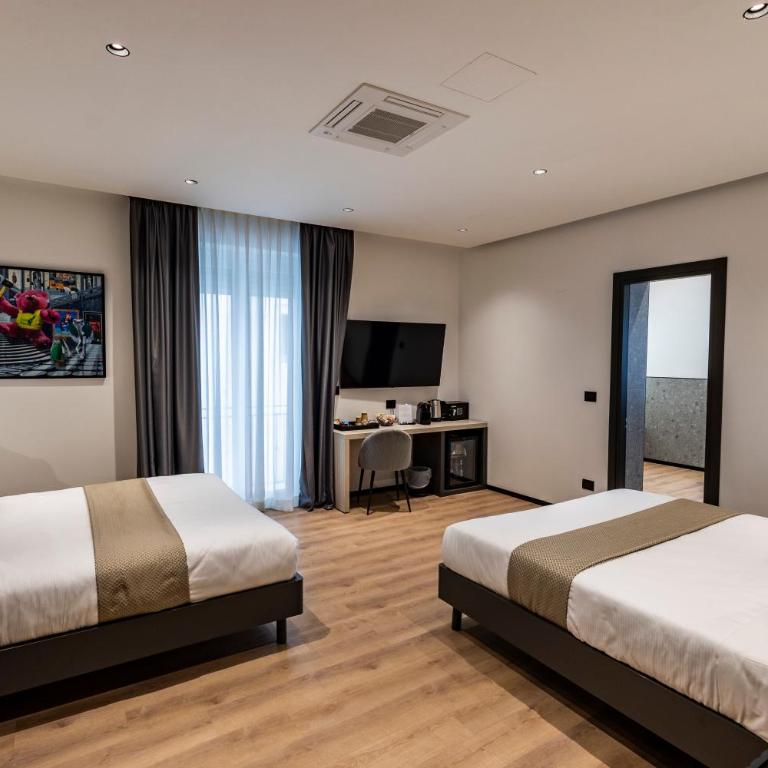 Corso 84 Luxury Suites - Deluxe Zimmer mit Kingsize-Bett - 2