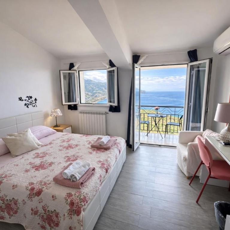 Blue Sky House - Camera Matrimoniale con Balcone e Vista Mare - 11