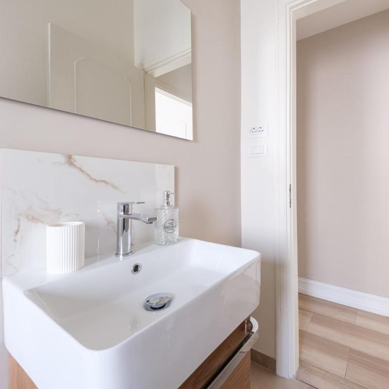 Casa Vacanze Piazza Europa - Appartamento Premium con 3 Camere da Letto e Balcone - 21