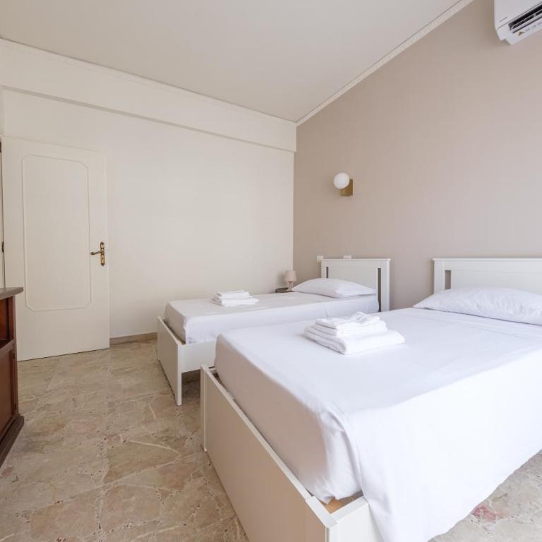 Casa Vacanze Piazza Europa - Appartamento Premium con 3 Camere da Letto e Balcone - 19