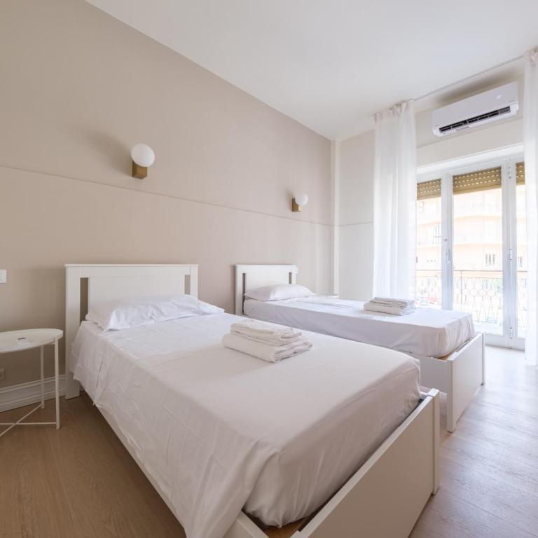 Casa Vacanze Piazza Europa - Appartamento Premium con 3 Camere da Letto e Balcone - 23
