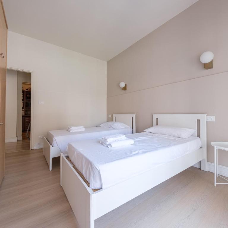 Casa Vacanze Piazza Europa - Appartamento Premium con 3 Camere da Letto e Balcone - 24