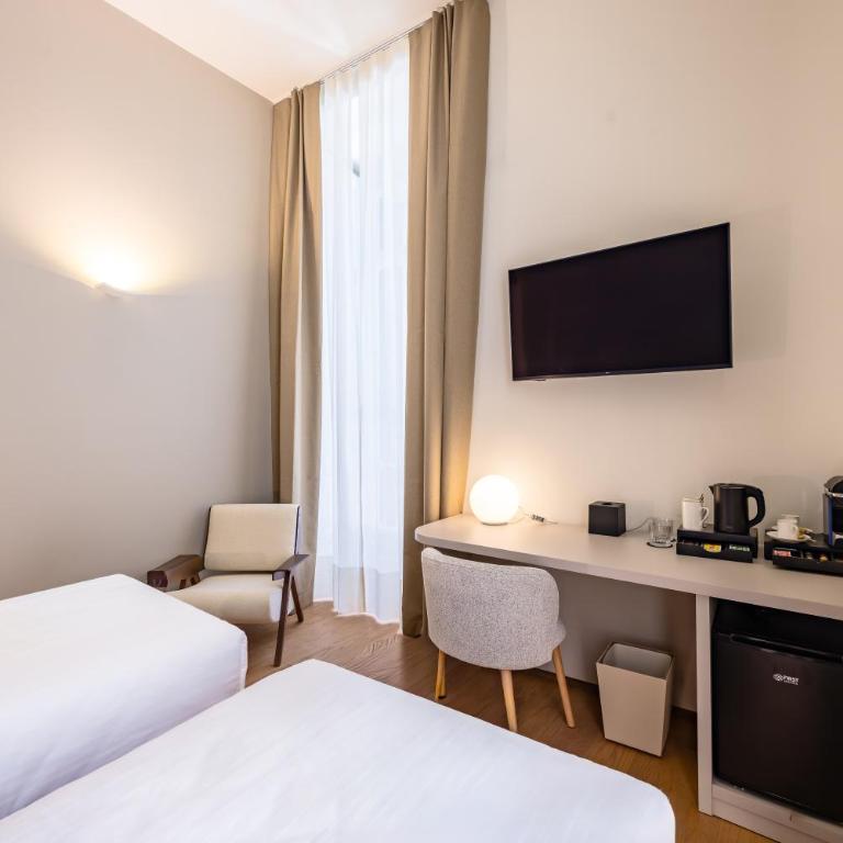 Caracolè Luxury Suites - Habitación Doble con balcón - 2 camas - 6