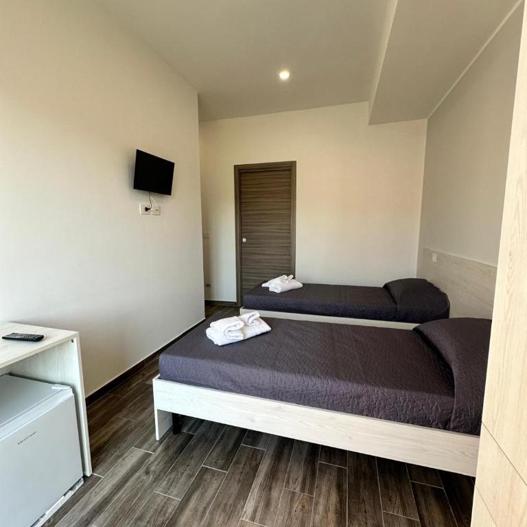 Spina Brothers' Holiday Rooms - Camera Deluxe Matrimoniale/Doppia con Letti Singoli - 2
