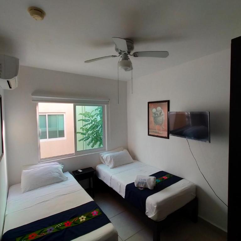 CasaMEXH Lunamar - Despierta, toma café en la 5ta Av, explora Xcaret, experimenta Tulum o algún cenote cercano - Unas vacaciones extraordinarias para tu familia y tus amigos - Three-Bedroom Villa - 28