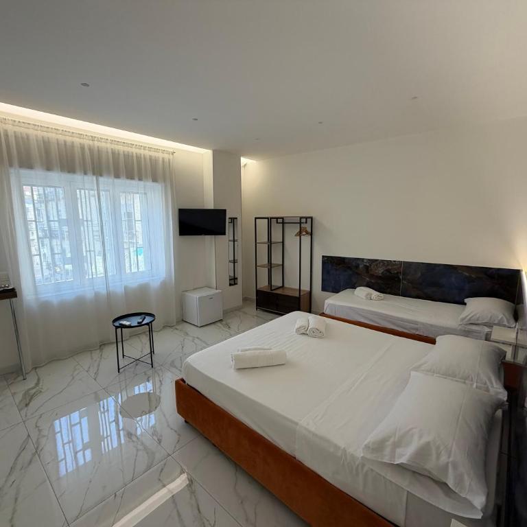 Emerald Rooms - Camera Tripla Deluxe - 7
