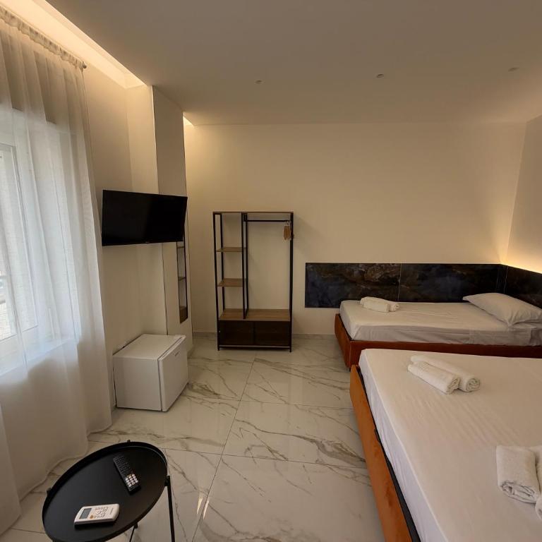 Emerald Rooms - Camera Tripla Deluxe - 8