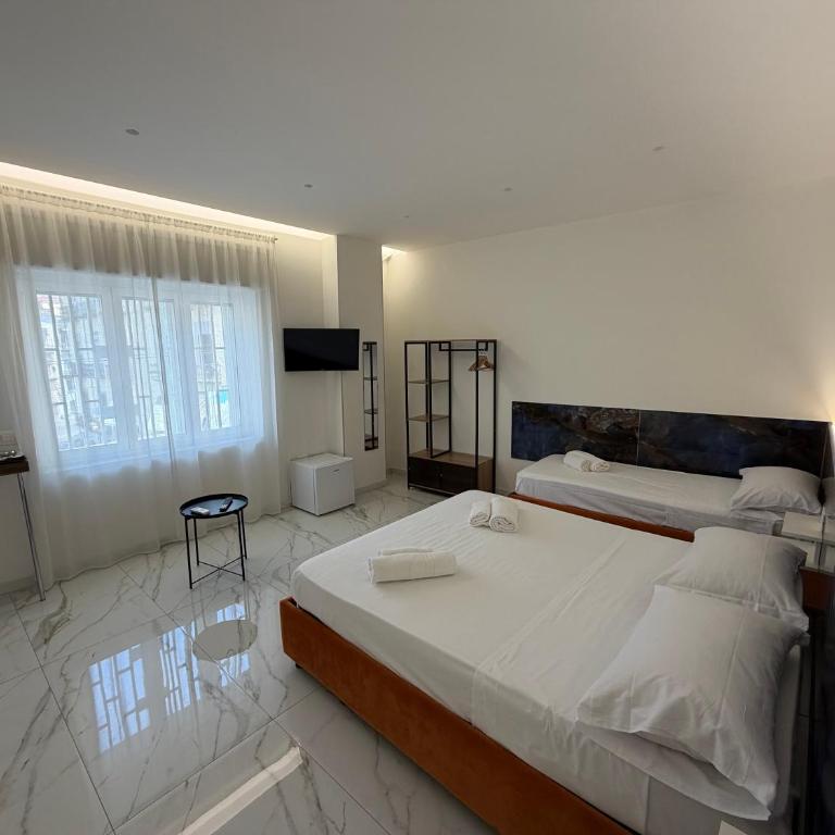 Emerald Rooms - Camera Tripla Deluxe - 10
