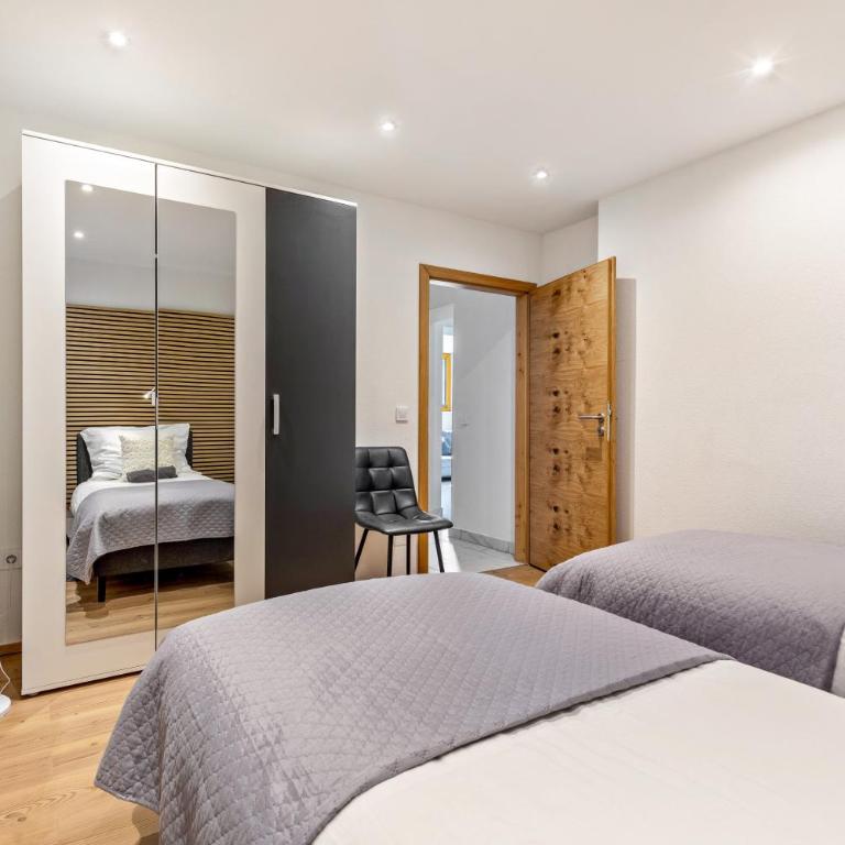 Schwarm Haus Apartment Saalfelden - Two-Bedroom Deluxe Apartment with Garden View - 32
