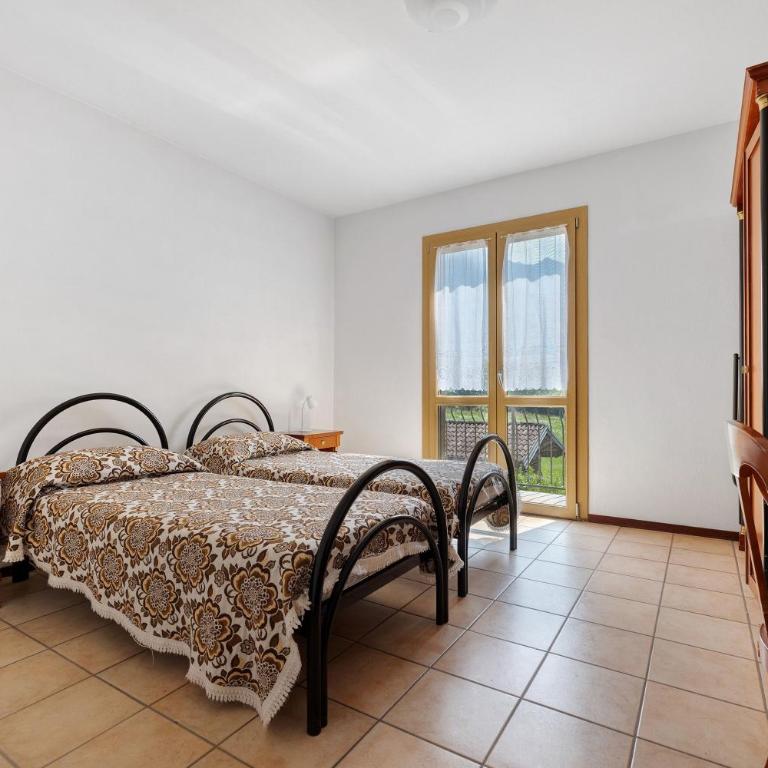 Casa Serena&Giacomo - Appartamento Deluxe con 2 Camere da Letto e Vista Giardino - 17