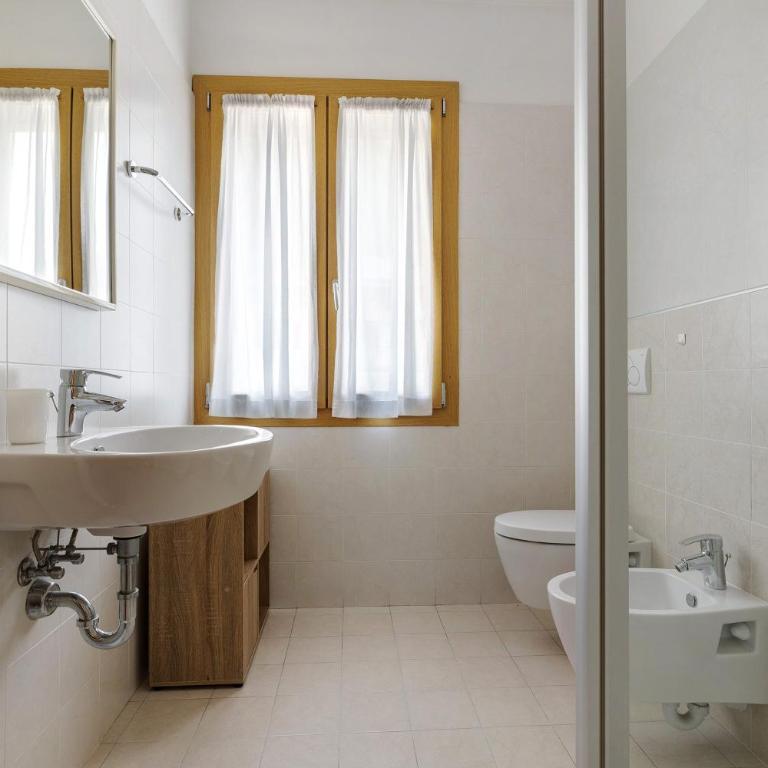 Casa Serena&Giacomo - Appartamento Deluxe con 2 Camere da Letto e Vista Giardino - 15