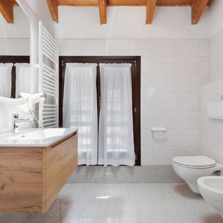 Casa Serena&Giacomo - Appartamento Deluxe con 2 Camere da Letto e Vista Giardino - 10