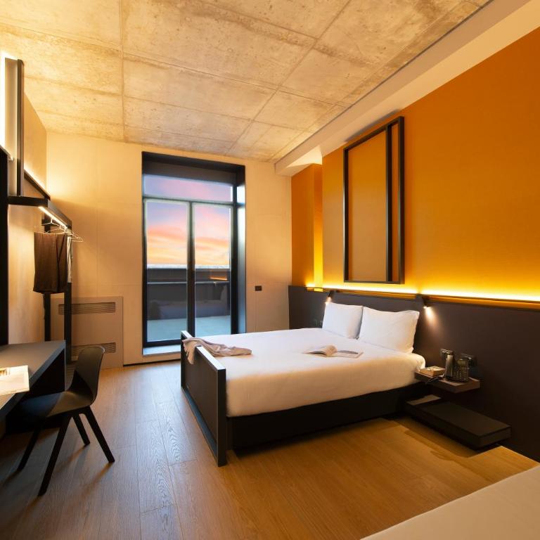 Breda Suites Hotel Milano - Camera Tripla con Patio - 1