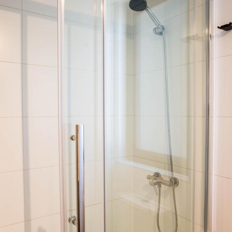 Cozy 1BR Getaway for Three in Vibrant Nunoa - Apartment - 29