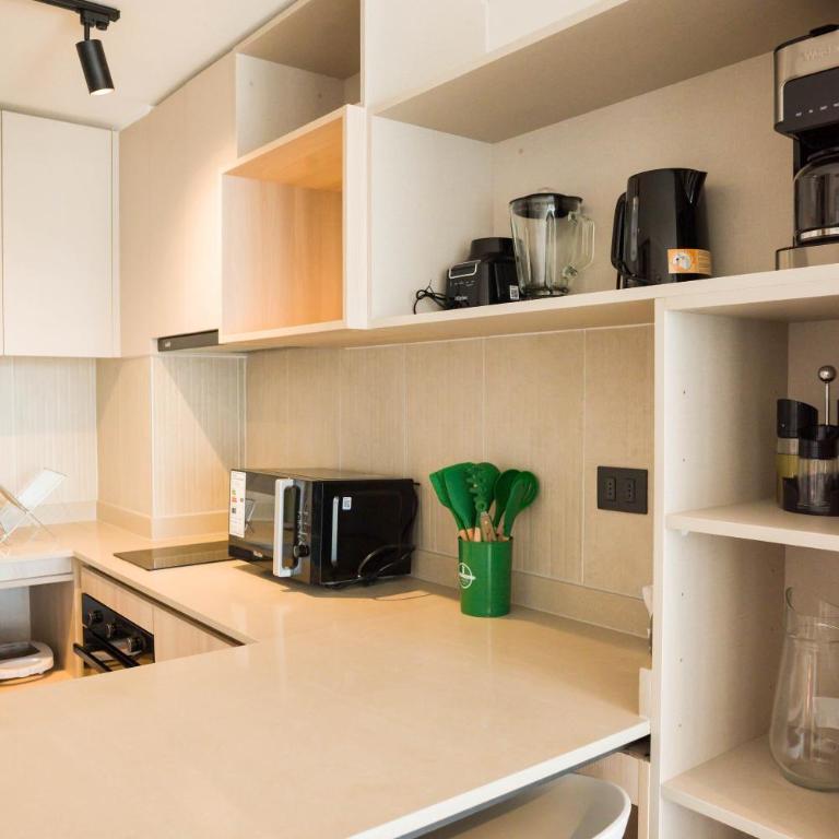 Cozy 1BR Getaway for Three in Vibrant Nunoa - Apartment - 22