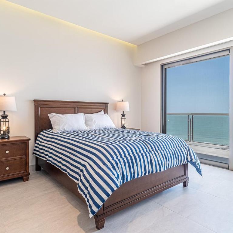 The Grand Horizon Élite - 4BR/4BA Beachfront Condo - Casa - 16
