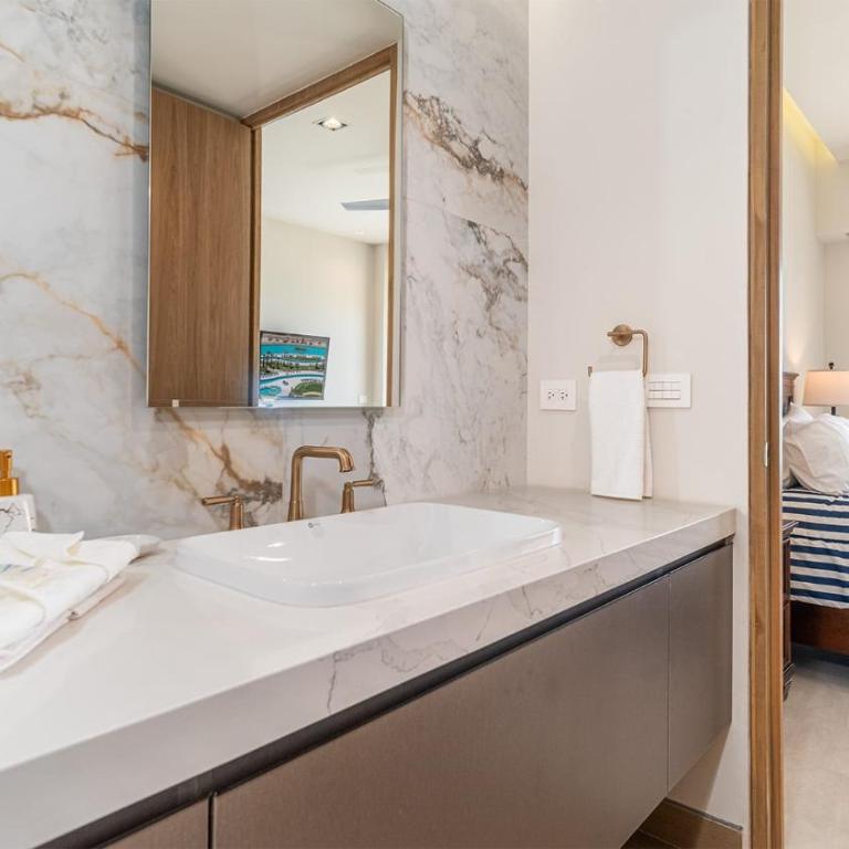 The Grand Horizon Élite - 4BR/4BA Beachfront Condo - Casa - 18