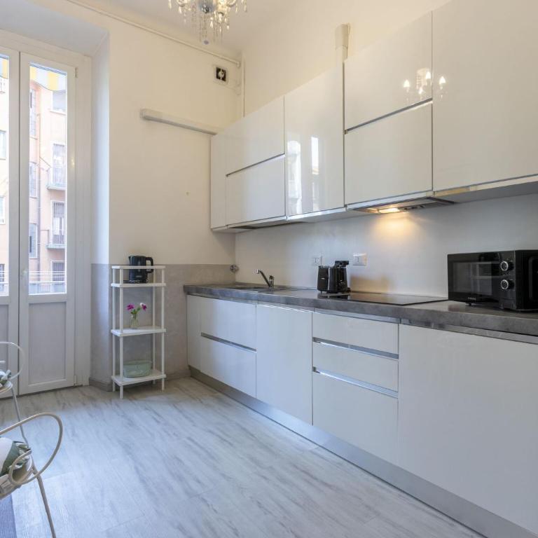 Caracciolo - Elegante Bilocale • Ascensore • Metro Vicina • Wi-Fi - Apartment - 12
