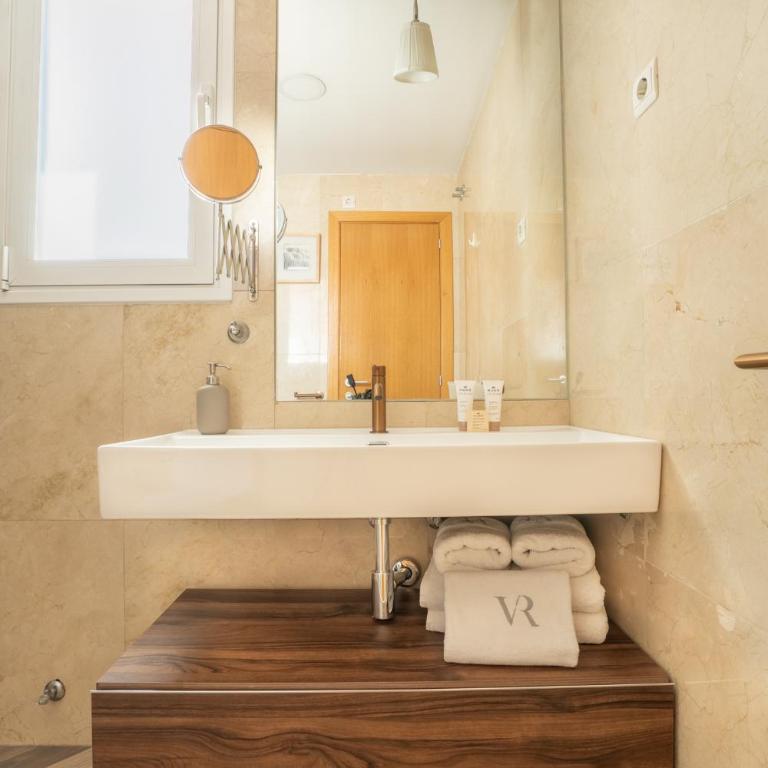 Vivienda con zona de trabajo, piscina y parking - Apartamento de 1 dormitorio - 21