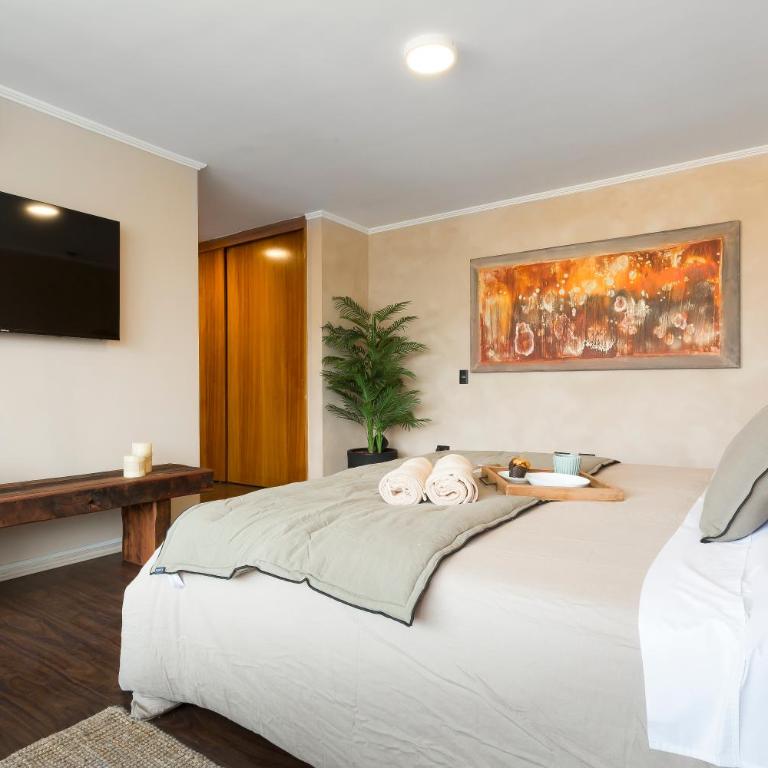 Cómodo depto familiar con aire acondicionado, frente al Parque Arauco - Apartamento - 24