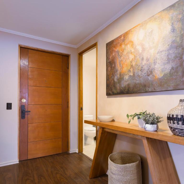 Cómodo depto familiar con aire acondicionado, frente al Parque Arauco - Apartamento - 32