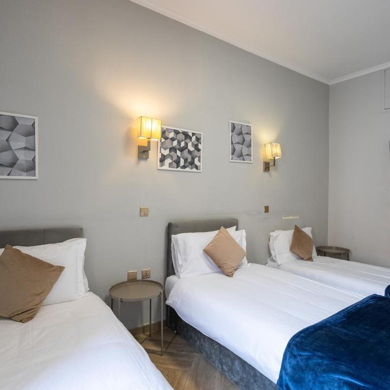 Giusi Rooms - Aetheria Esquilinus Guesthouse - Camera Tripla Comfort con Doccia - 4