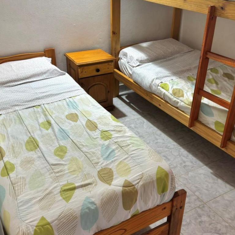 Departamentos pihue Puerto Madryn, Chubut - Habitación Familiar con vistas al jardín - 4