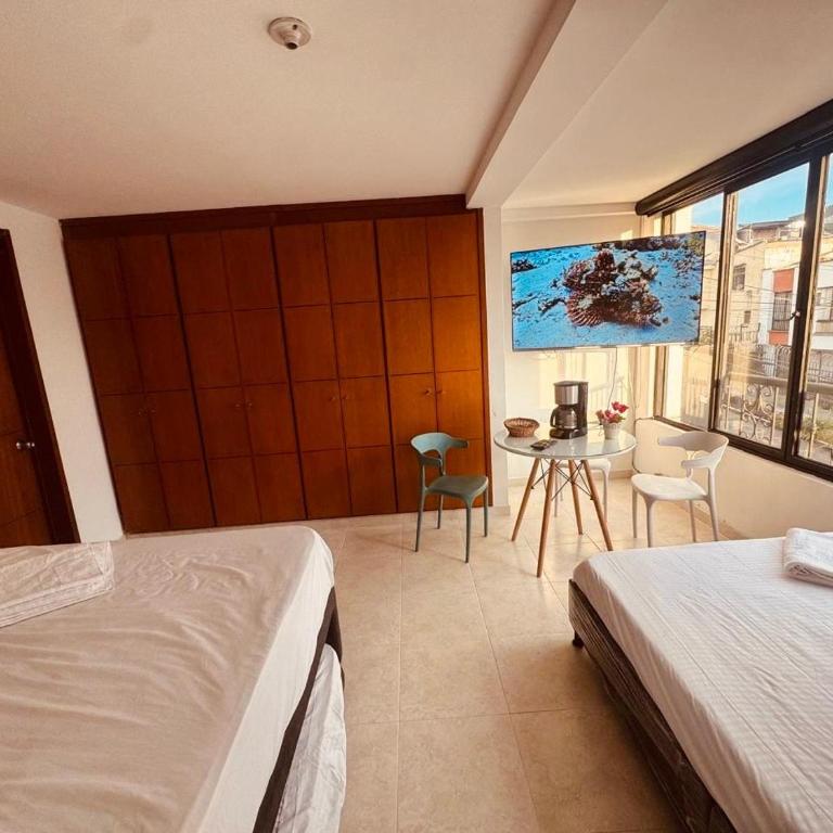Suite Deluxe con baño privado, Smart TV, minibar y Wifi, Casa Galán Suites - Suite Familiar Deluxe - 2