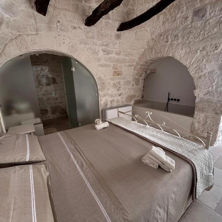 Dimora i trulli dell'ulivo - Camera Matrimoniale con Bagno Privato - 4