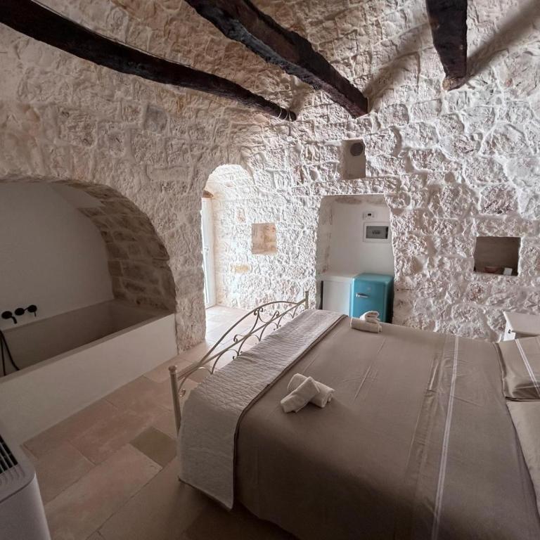 Dimora i trulli dell'ulivo - Camera Matrimoniale con Bagno Privato - 1