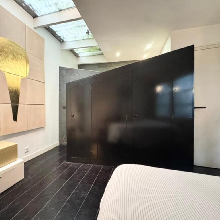 Maison loft de 100 m avec jardin à Paris - Maison de Vacances - 11