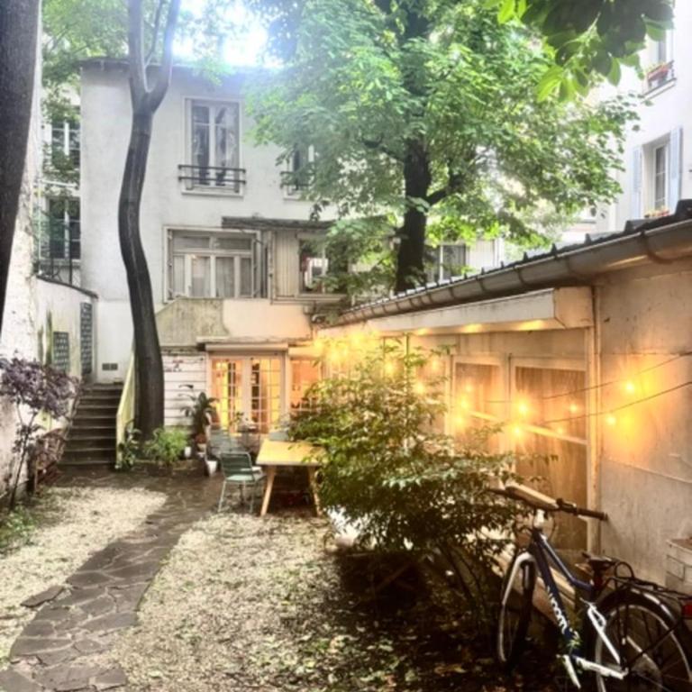 Maison loft de 100 m avec jardin à Paris - Maison de Vacances - 16