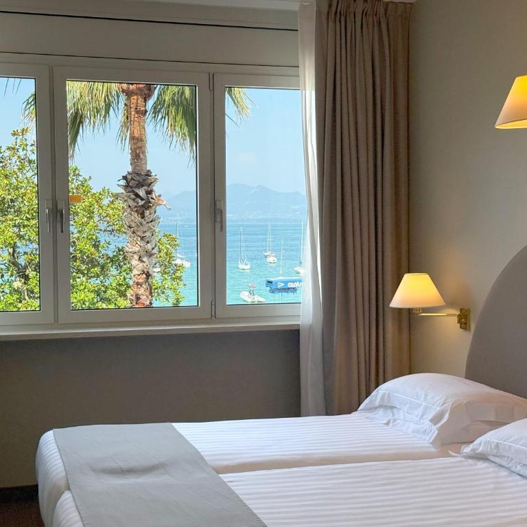 Hotel Nettuno - Chambre Lits Jumeaux/Double Confort - Vue sur Lac - 8