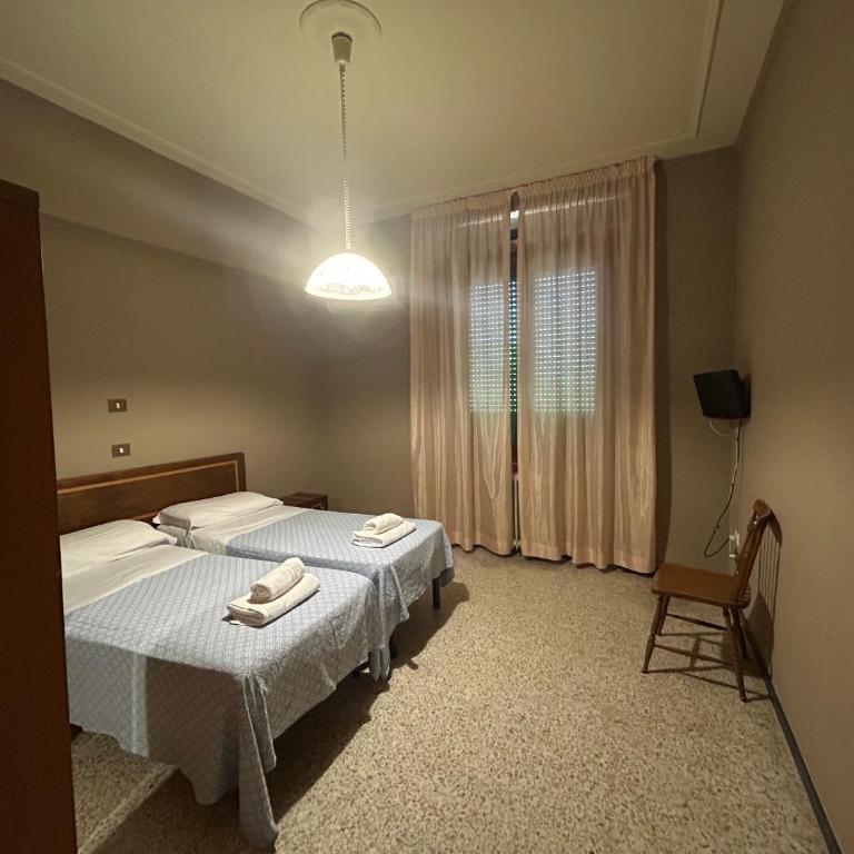HOTEL CONCORDIA - Camera Budget Doppia con Letti Singoli - 1